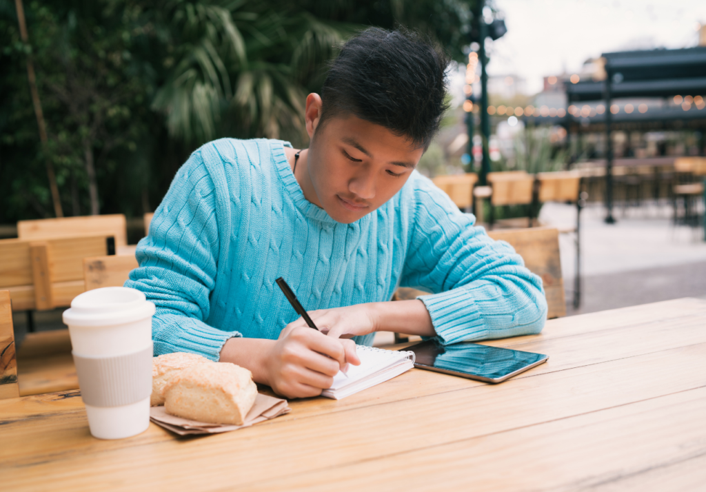  Young Canadian student checking their bank account on a phone — best student chequing accounts in Canada 2026