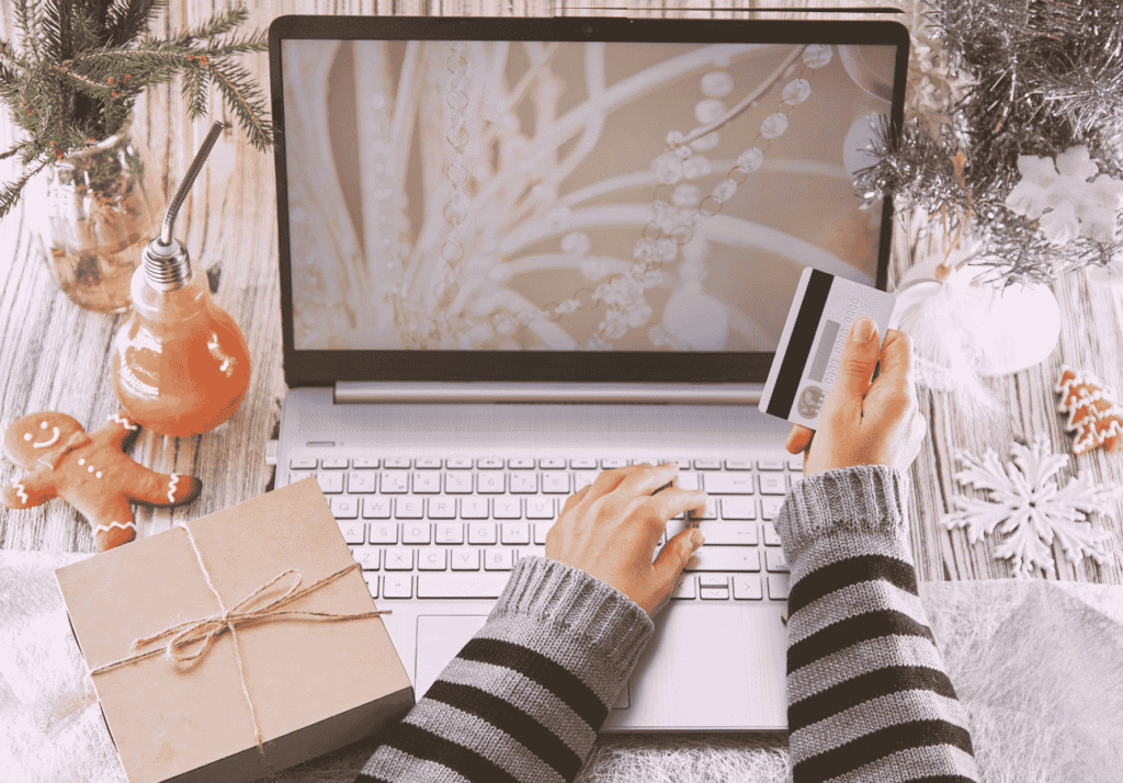 Parents shopping online and earning cash-back rewards during the holiday season.