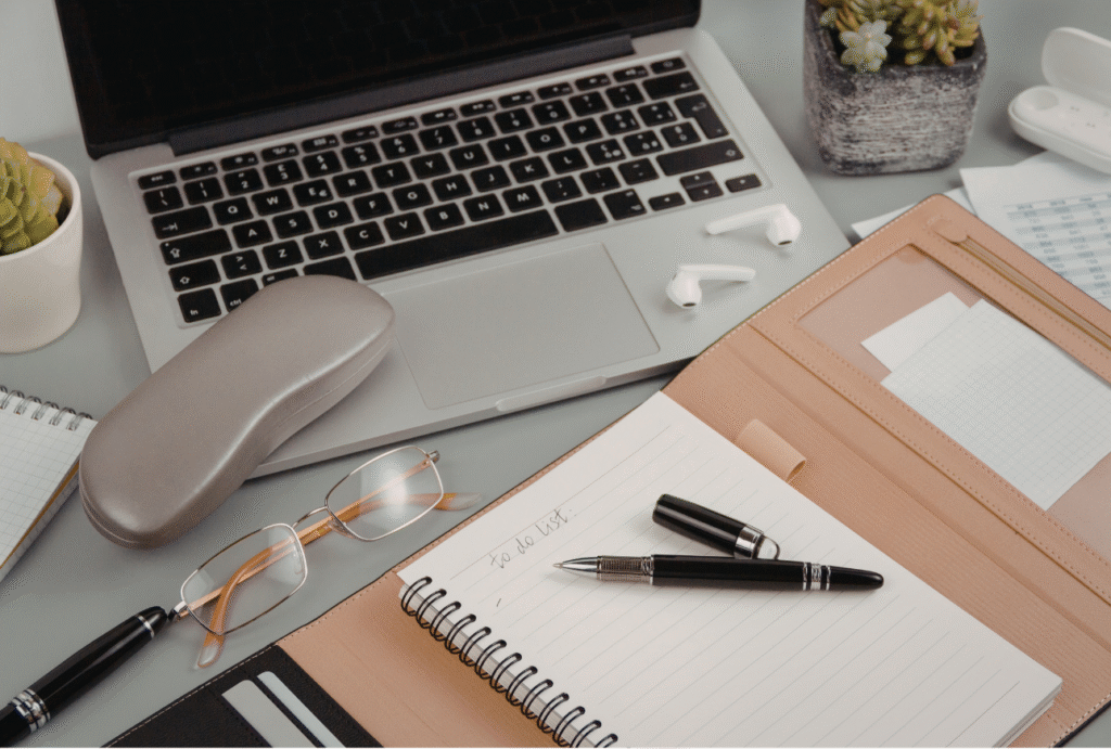 Desk workspace with laptop, notebook, and financial documents illustrating RRSP deadline 2026 tax planning in Canada.