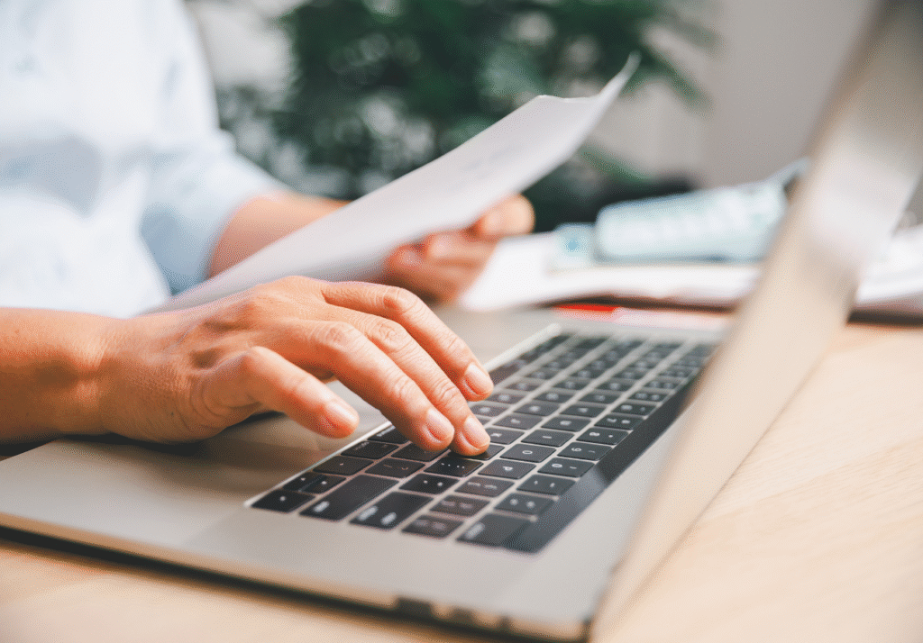 Person reviewing RRSP contribution details before March 2 deadline in Canada